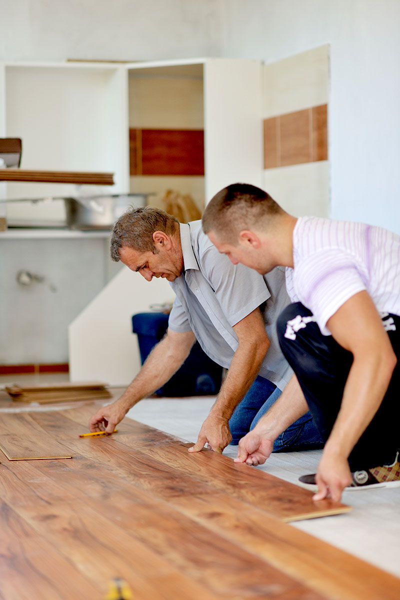 Installing laminate flooring in new home indoor